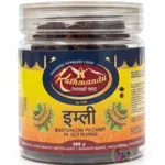 Kathmandu Tamarind Sticks (इमली) - 200 g 2 A 200g jar of Kathmandu brand Tamarind Sticks (Imli) featuring a yellow and blue label with whole tamarind illustrations.