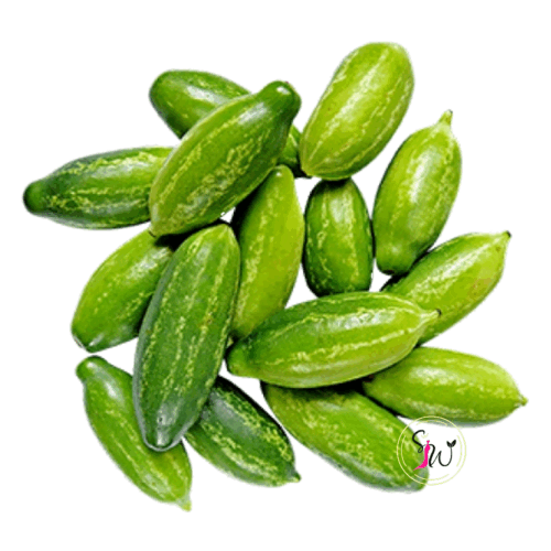 Home 39 Fresh Tindly (प्रवाल) ivy gourd vegetable on wooden board