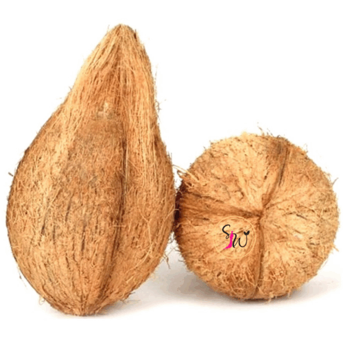 Fresh whole coconut (जटा नरिवल) with husk and cracked pieces