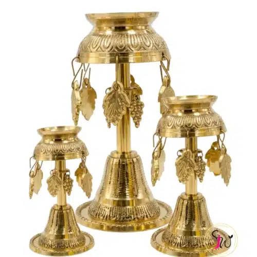Traditional brass Akhand diya stand with hanging leaf decorative oil lamp holder